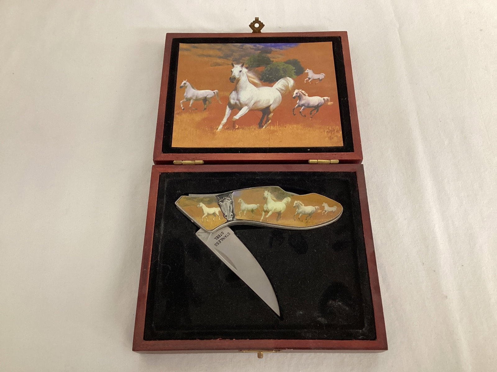 Wild White Horses Pocket Knife in Box: picture handle peeling off