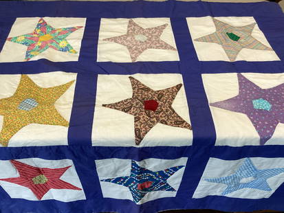 Hand Made Quilt: approx. 49" square, small tear at a seam