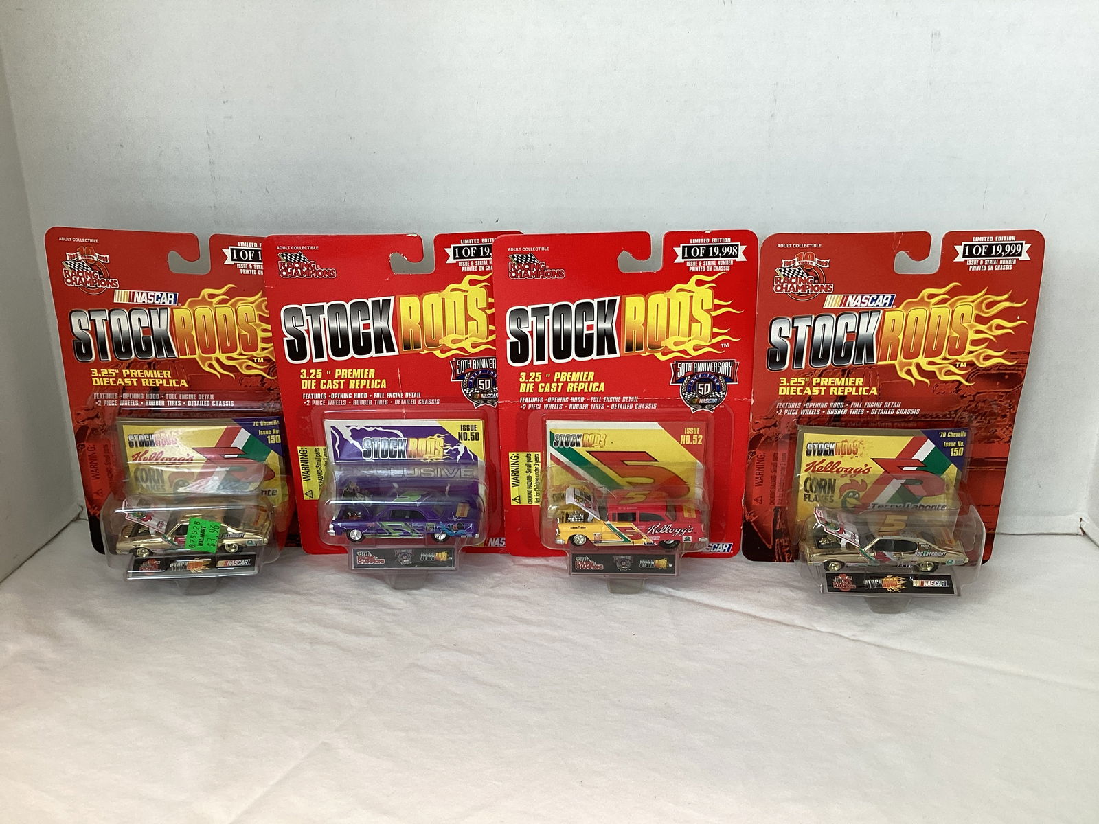 Four Racing Champions NASCAR Terry Labonte Stock Rods Diecast Replicas: 1970 Chevelle, 1964 Impala, 1955 Chevy, and 1970 Chevelle