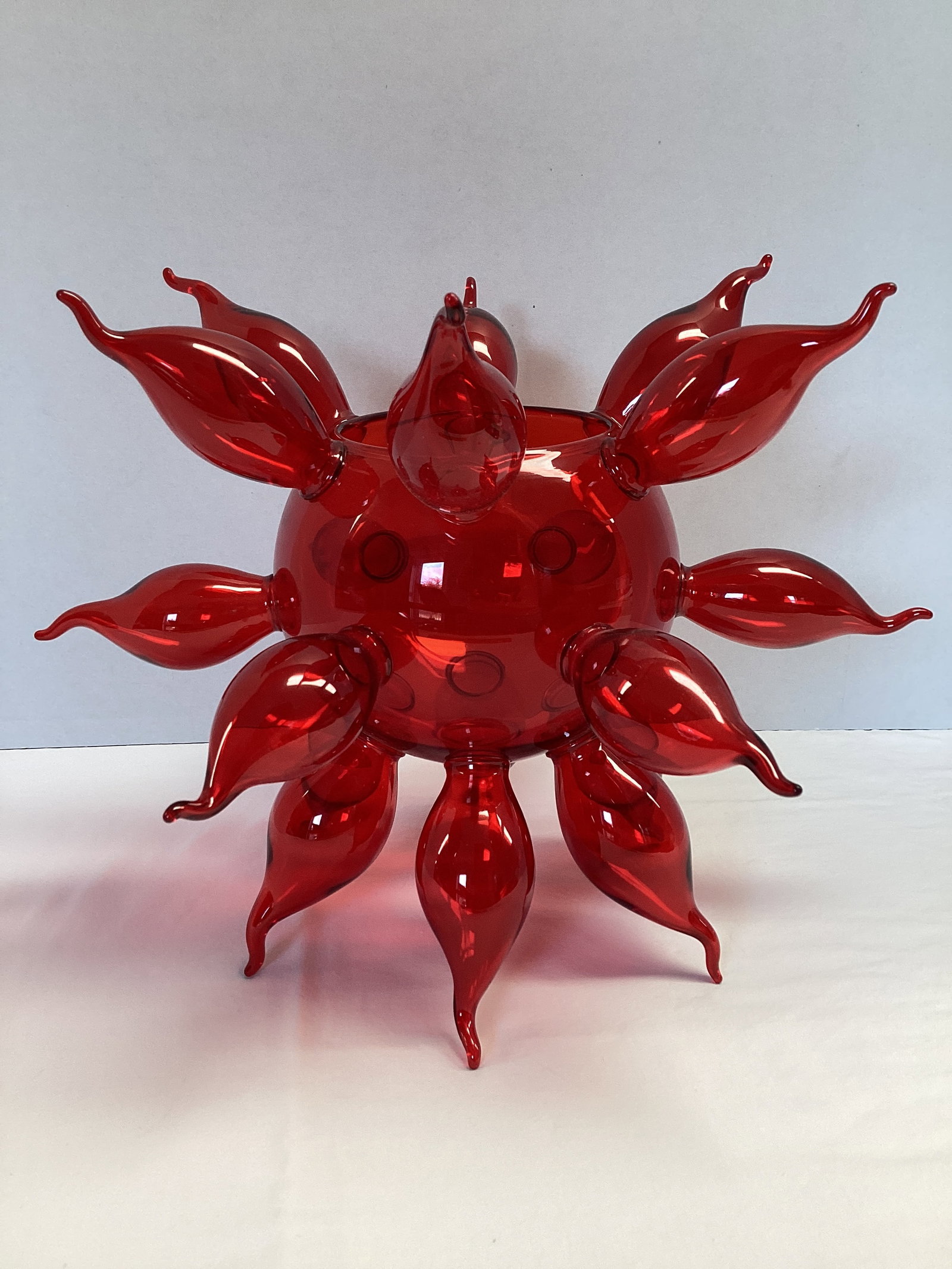 Rare and Unique Red Blown Glass Sun Star: has two openings, one is 3 5/8" diameter and the other is 1" diameter, approx. 10" diameter total