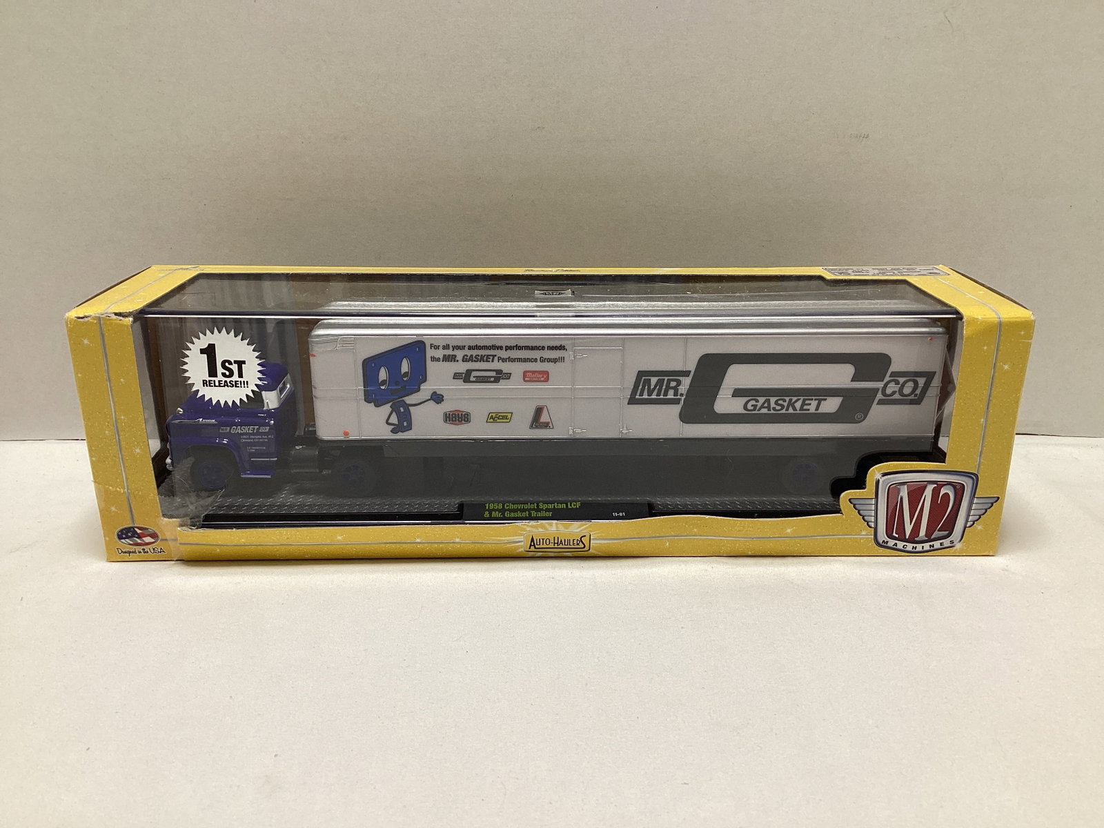 M2 Machines Auto-Haulers 1958 Chevrolet Spartan LCF and Mr. Gasket Trailer Diecast: some damage to box