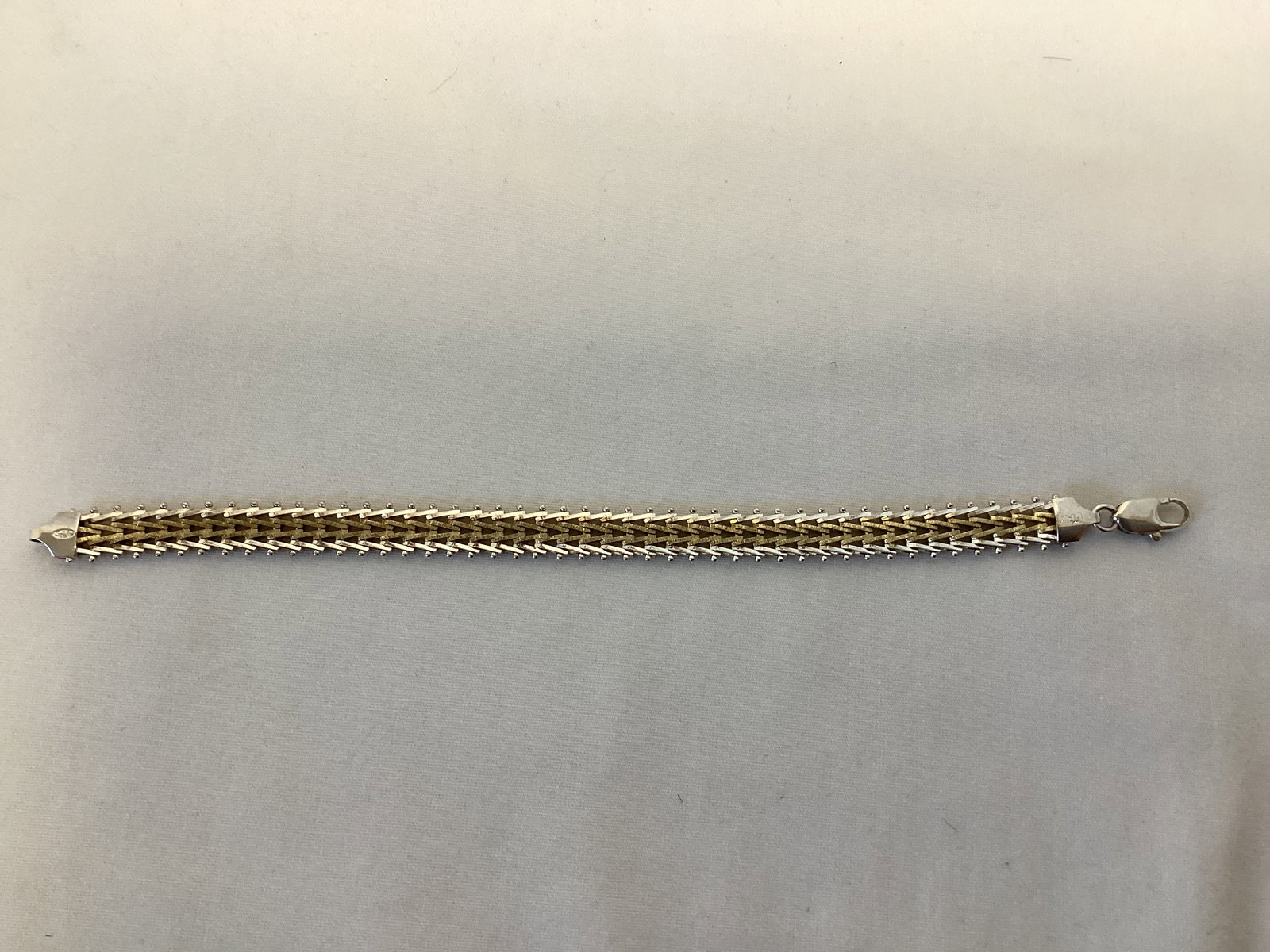 Sterling Silver Bracelet: 7" long, marked 925 Italy, 0.376 troy ounces