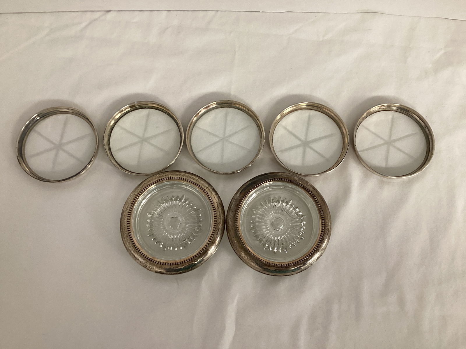 Glass Coasters with Sterling Rims: Five 3 1/8" and two 4"