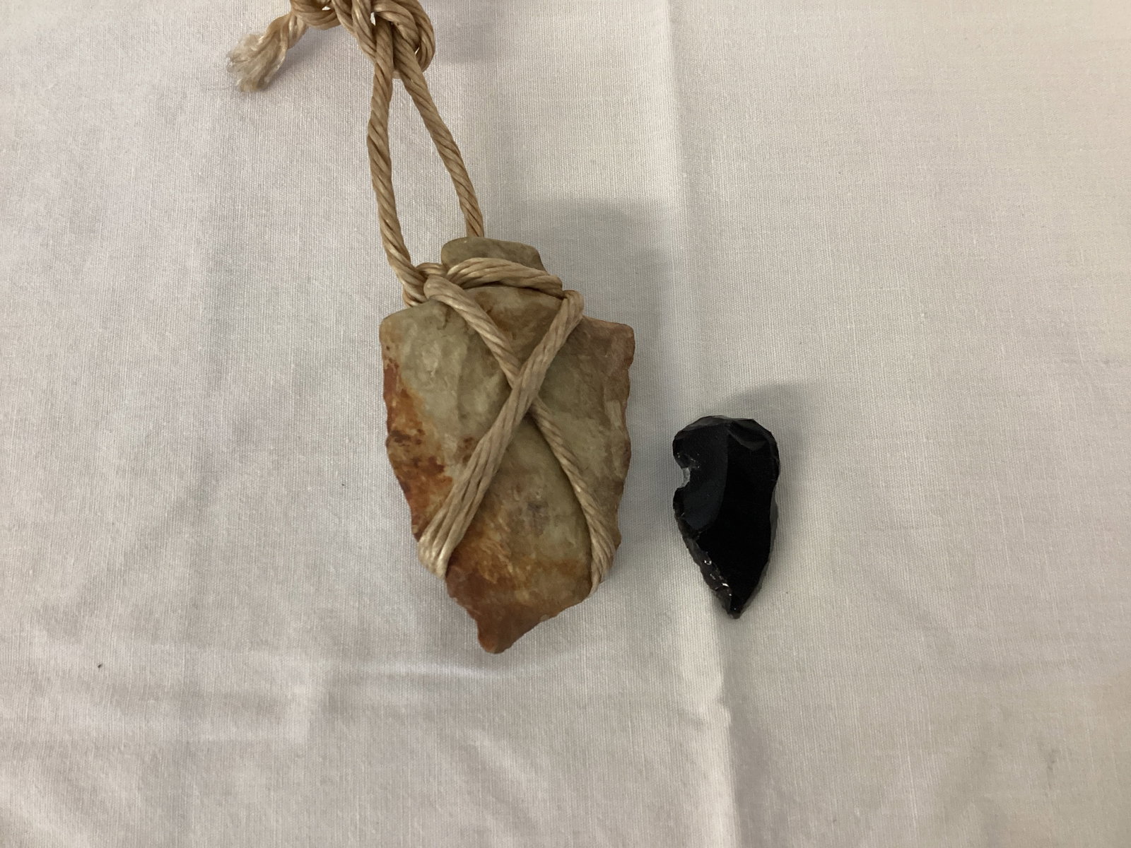 Two Arrowheads: 1 1/4" and 2 1/2" long