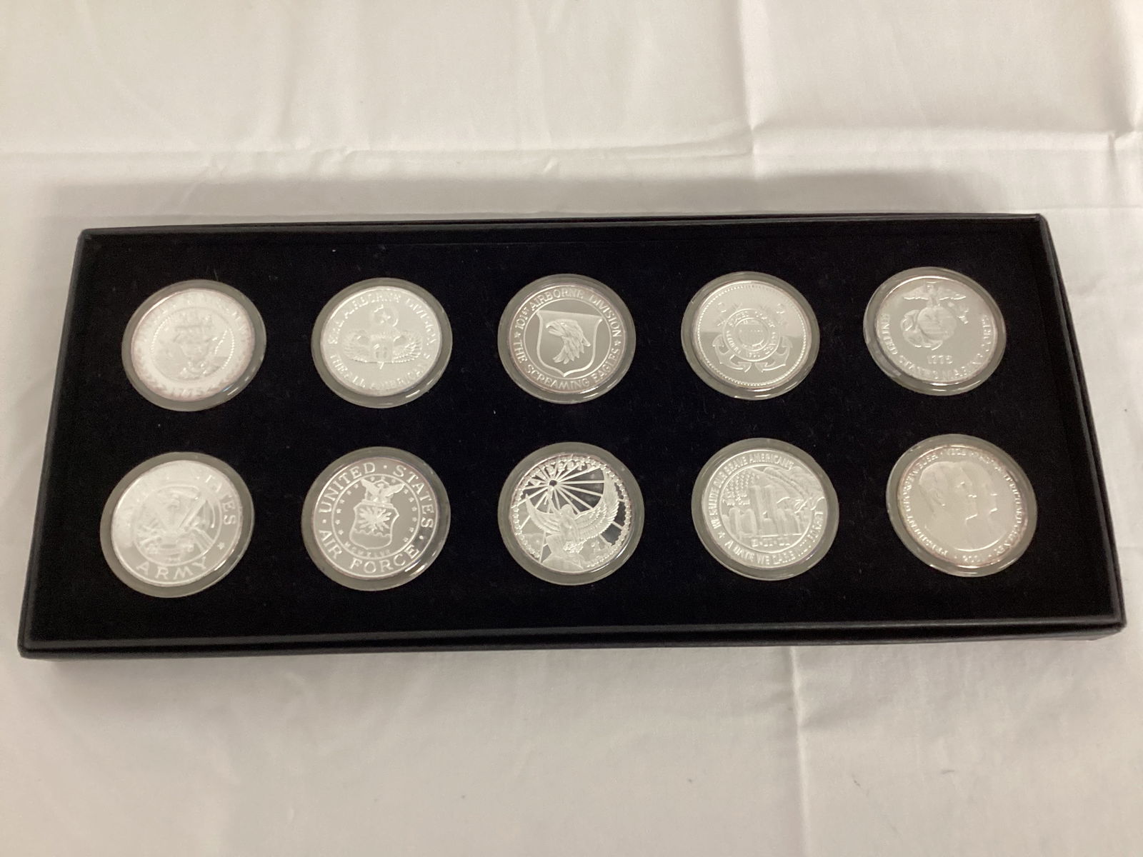 Ten US Military Medallions: some marked .999 silver, possibly silver plated, please preview and see all photos for condition