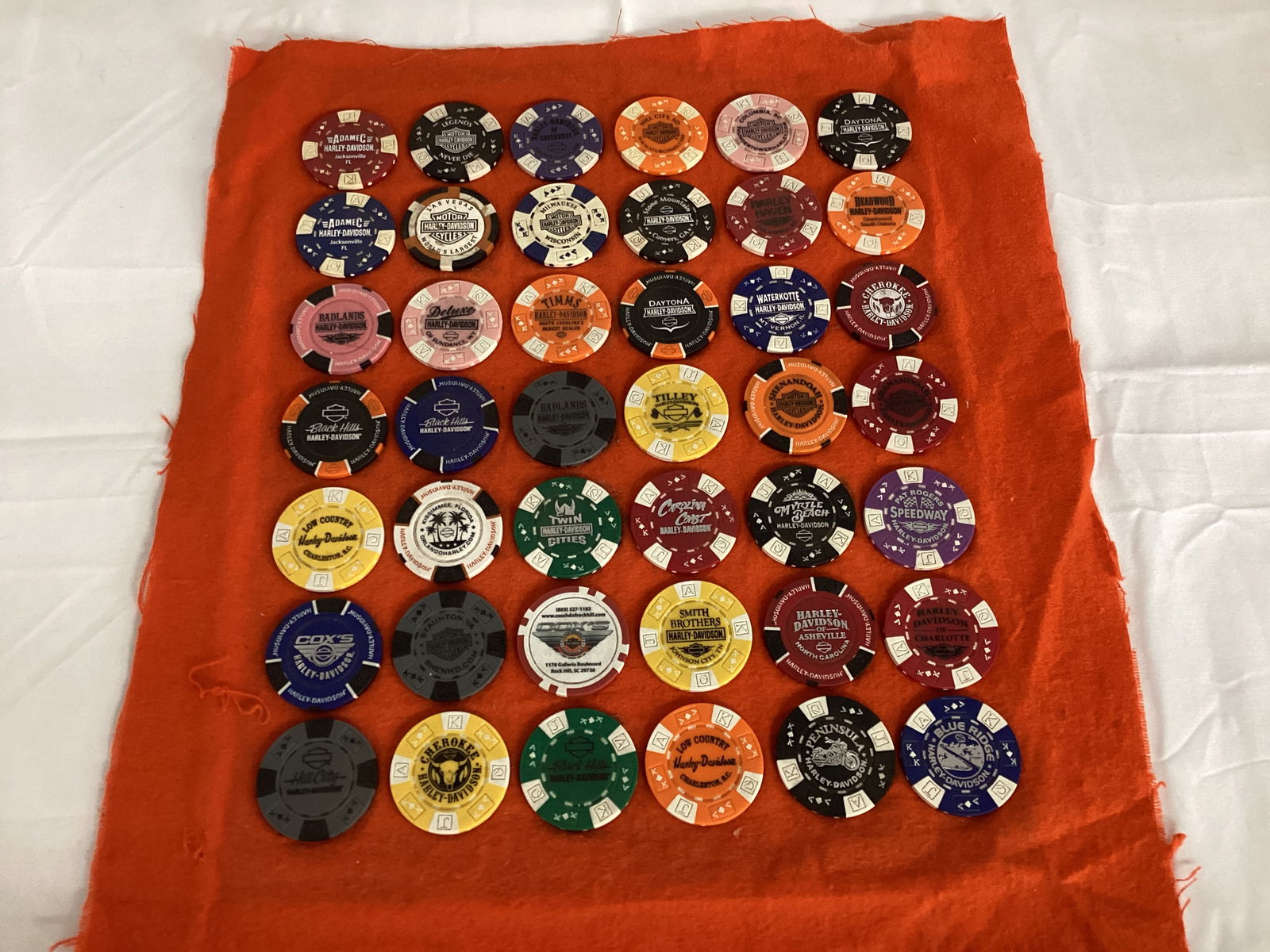 Harley-Davidson Souvenir Poker Chips: glued to fabric (one loose)