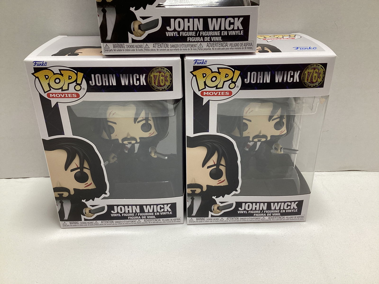 Three John Wick Funko Pops - 3