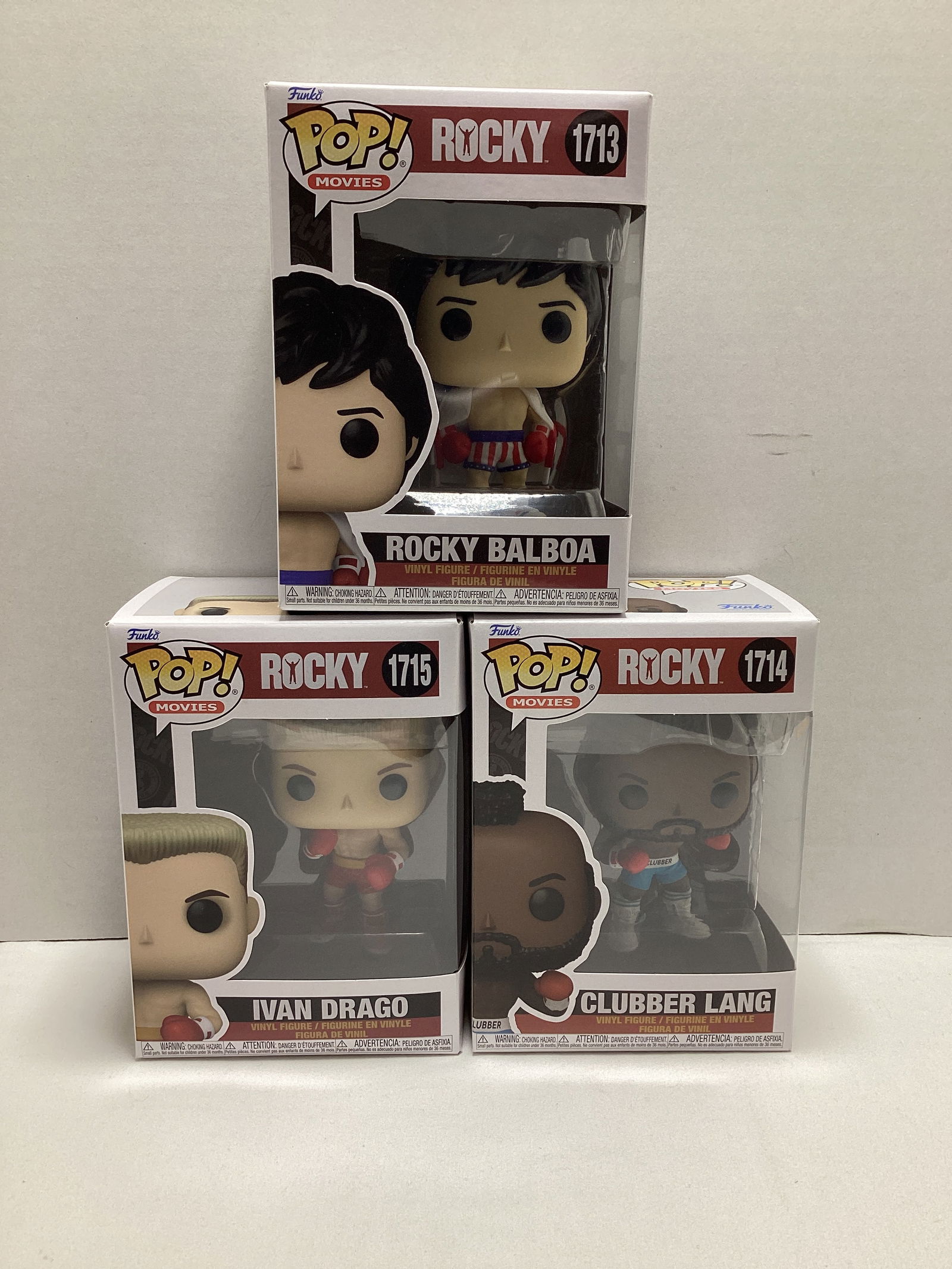 Three Rocky Funko Pops: Rocky Balboa, Ivan Drago, Clubber Lang