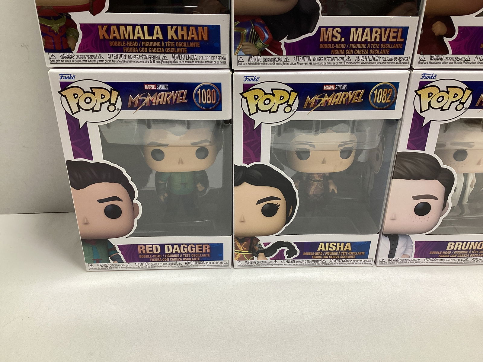 Six Marvel Comics Ms. Marvel Funko Pops - 3