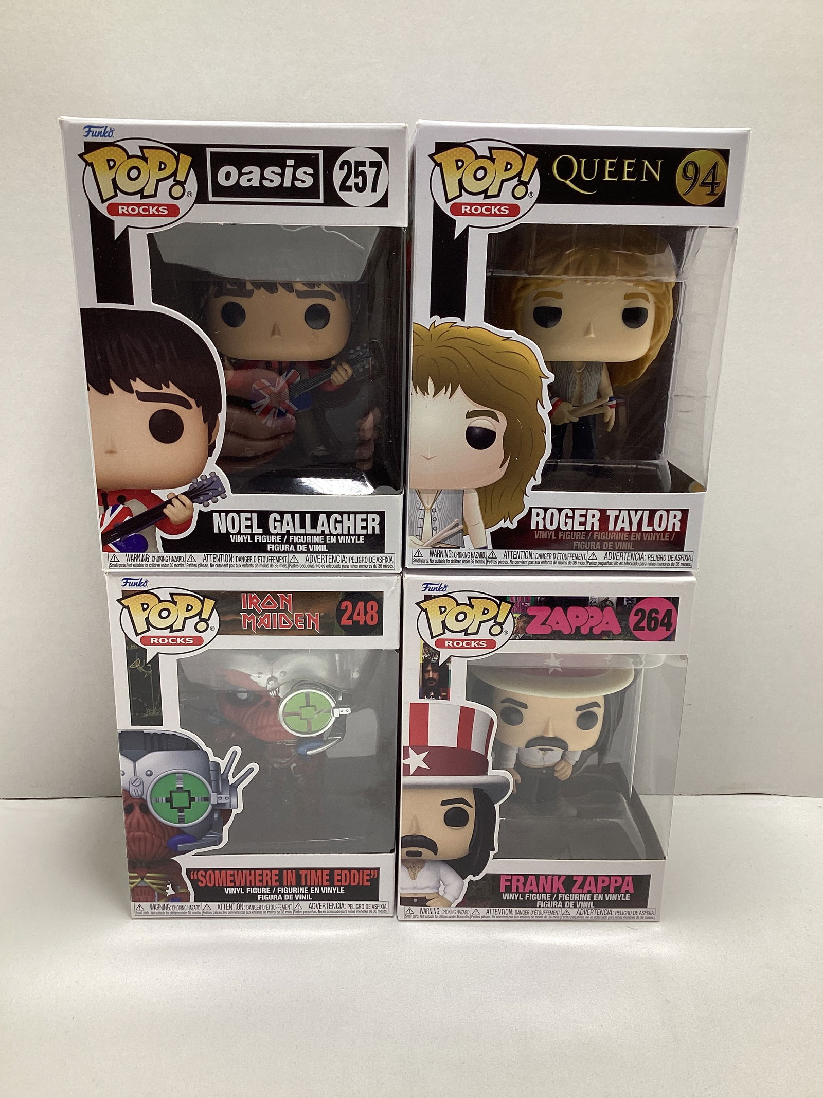 Four Musician Funko Pops: Oasis Noel Gallagher, Queen Roger Taylor, Iron Maiden "Somewhere in Time Eddie", Frank Zappa 