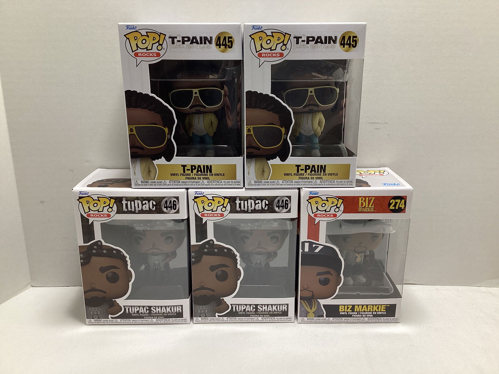 Five Rapper Funko Pops: T-Pain x2, Tupac Shakur x2, Biz Markie 