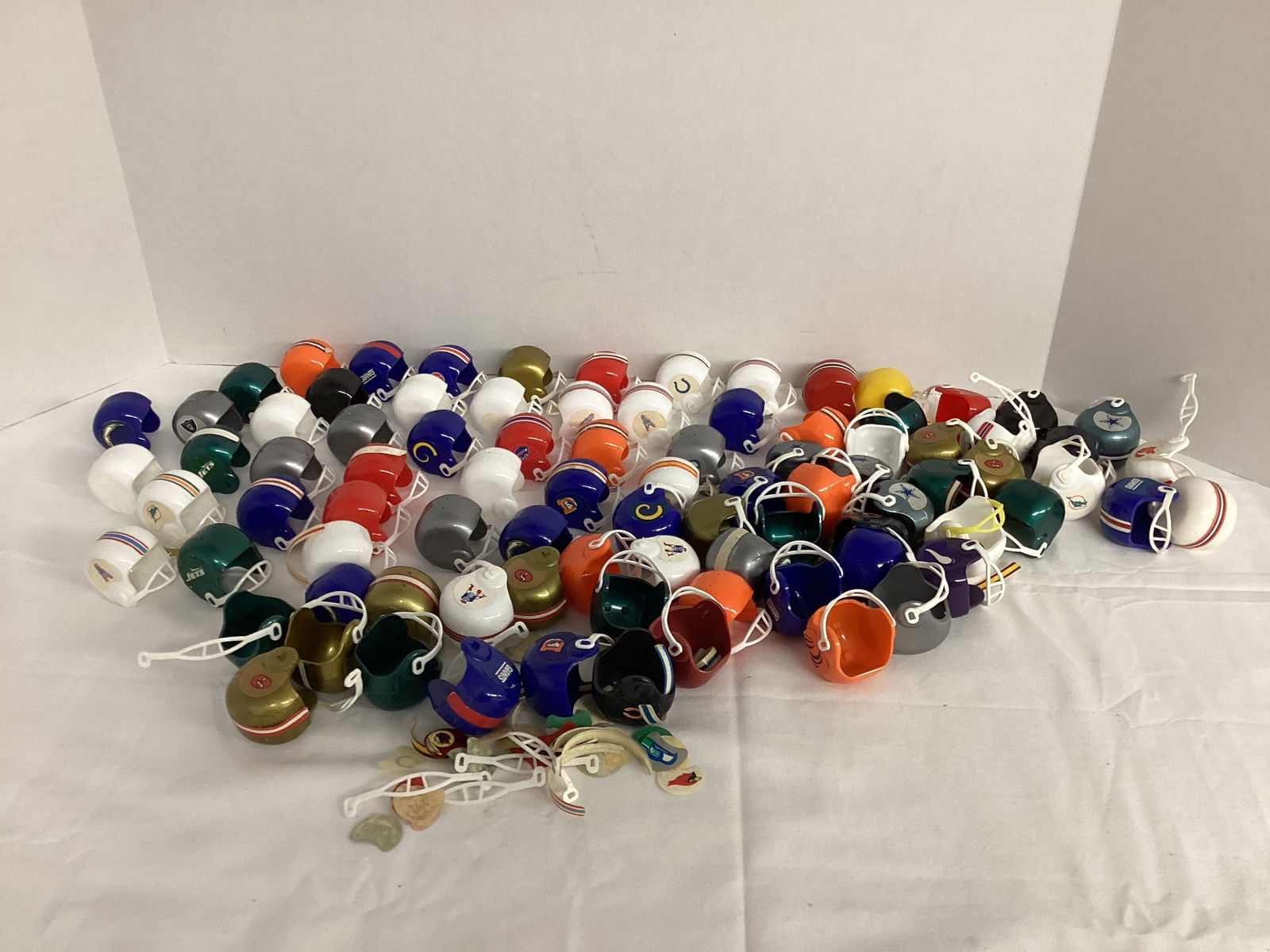 NFL Miniature Helmets: most of the stickers have come off 