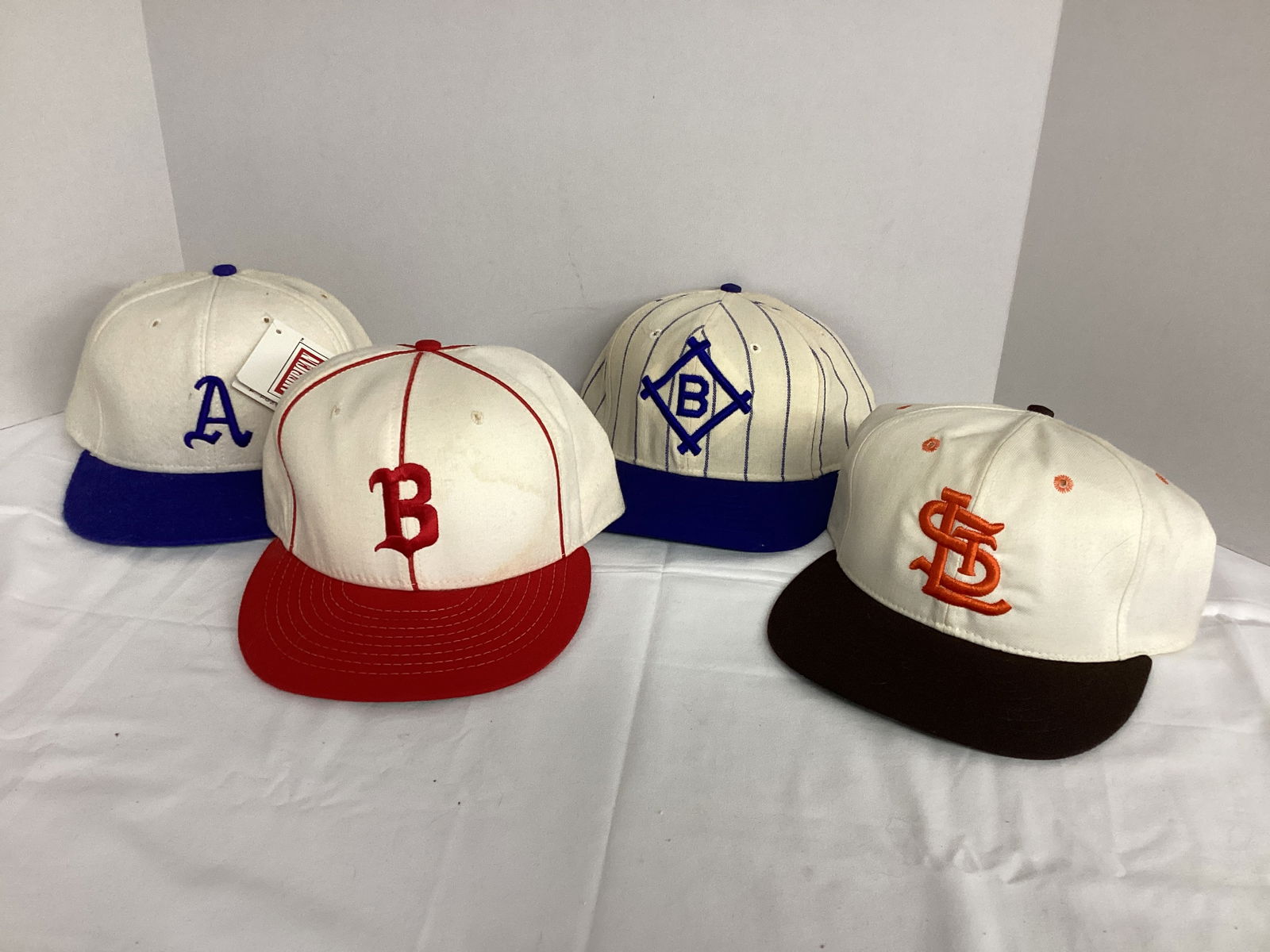 MLB Hats: need cleaning, may have some staining 