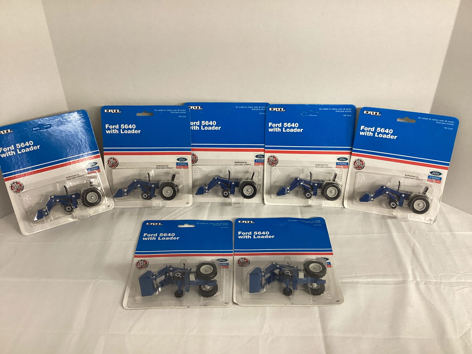 Seven ERTL Ford New Holland 5640 Tractor With Loader Diecasts (1 of 5)
