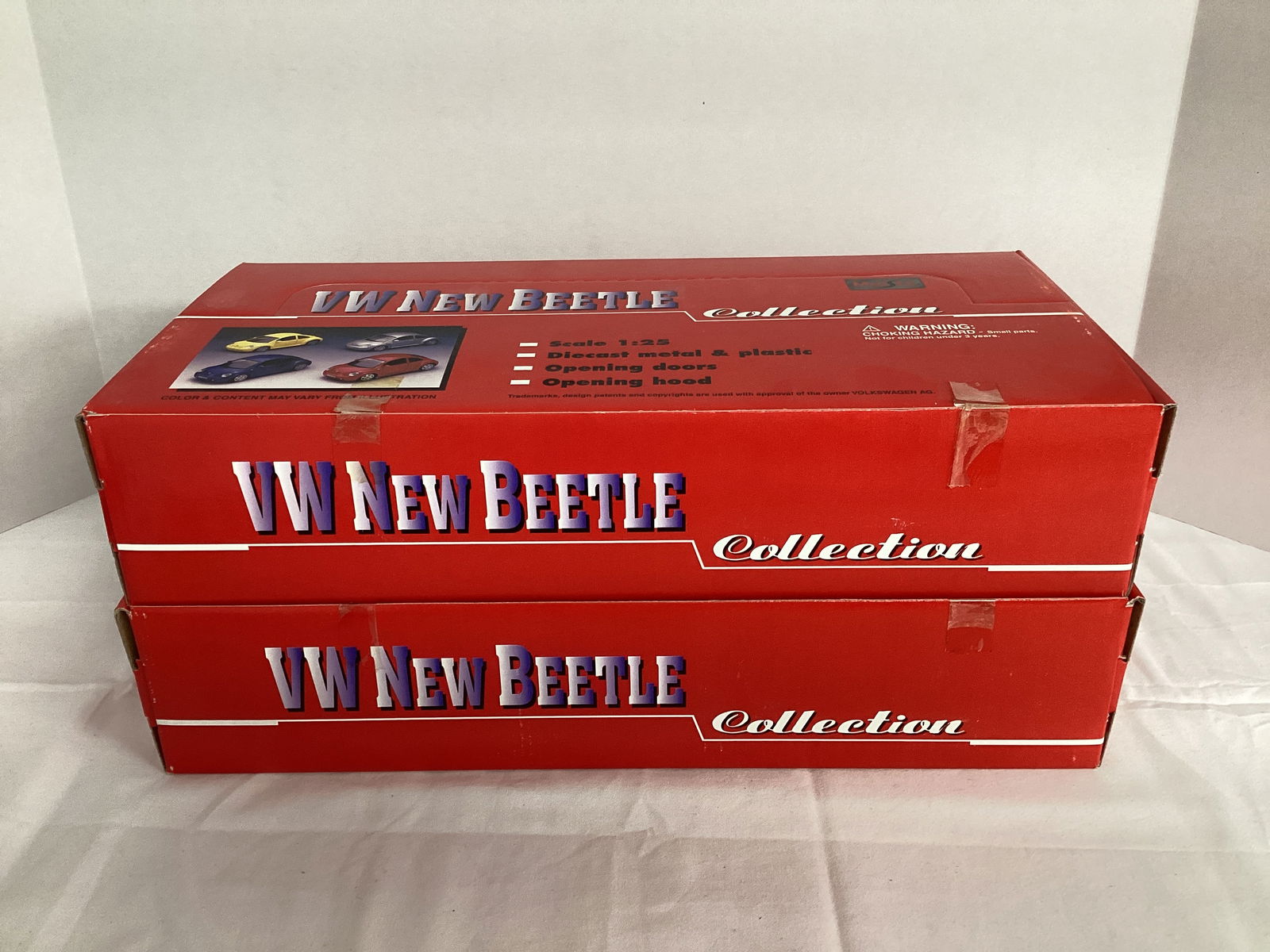 Two Maisto 1:25 Scale VW New Beetle Diecast Collections: . 