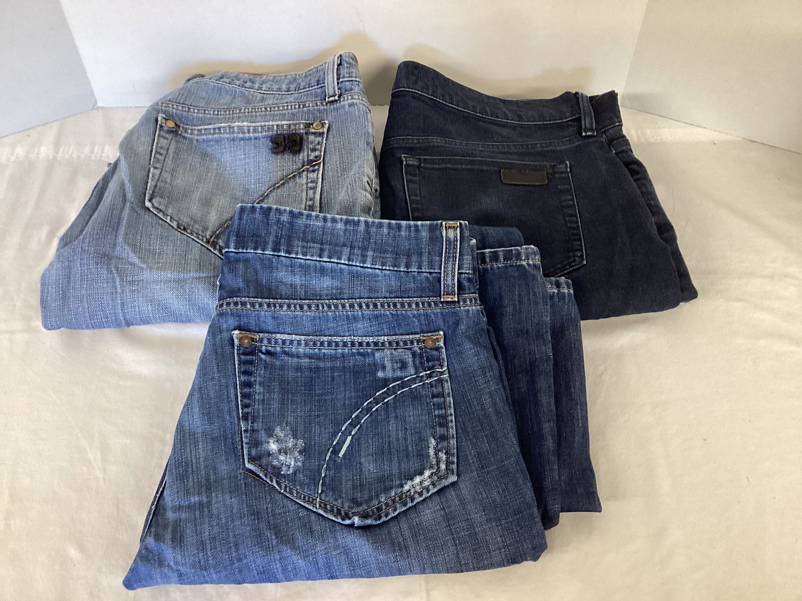 Three Pairs of Joe's Size 34 Jeans: . 