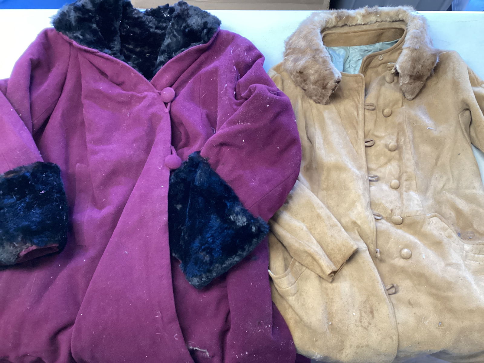 Two Vintage Ladie's Coats: Suede coat has collar that appears to be real fur, wool coat is fur lined with fur cuffs and collar (see photos for stamp mark), both need cleaning and may have some damage
