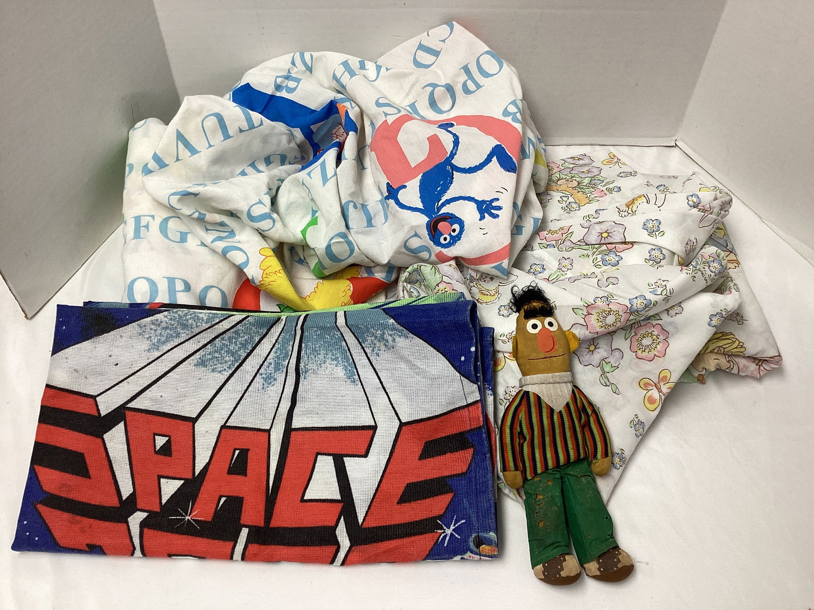 Children's Sheets and Sesame Street Doll: doll damaged 