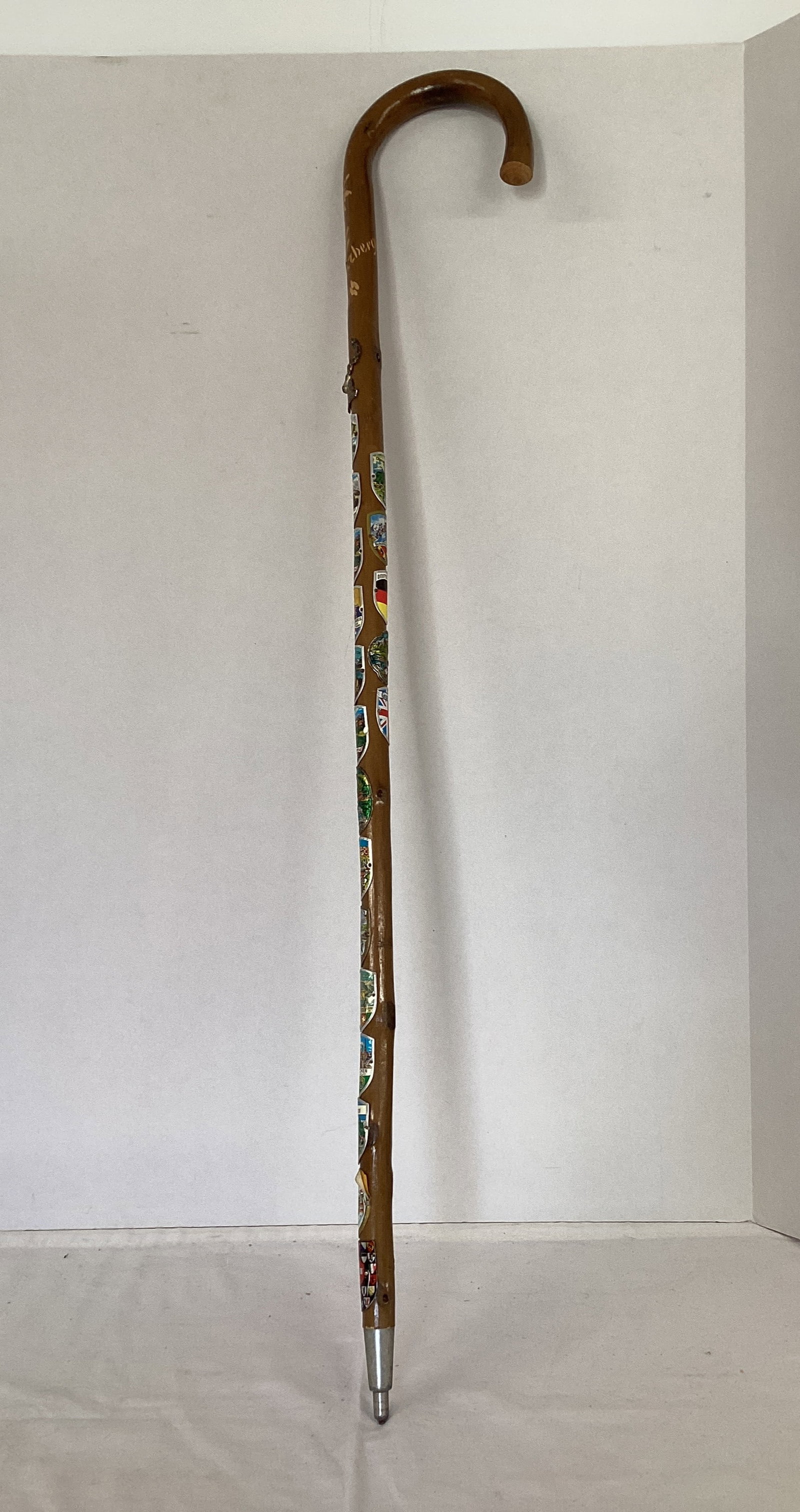 German Wood Cane with Metal Walking Badges: 37"