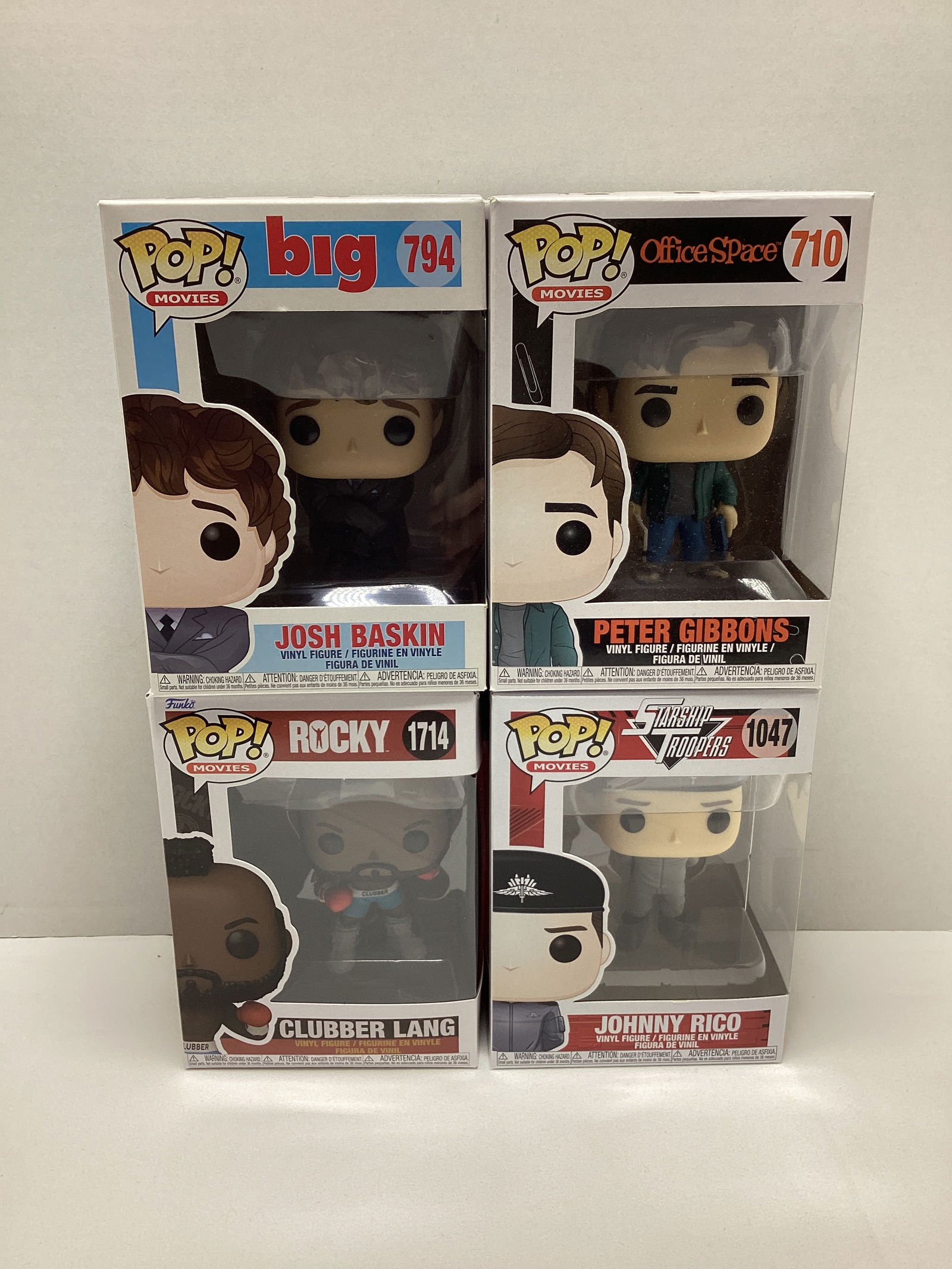 Four Movie Funko Pops: Clubber Lang (Rocky), Johnny Rico (Starship Troopers), Josh Baskin (Big), Peter Gibbons (Office Space)