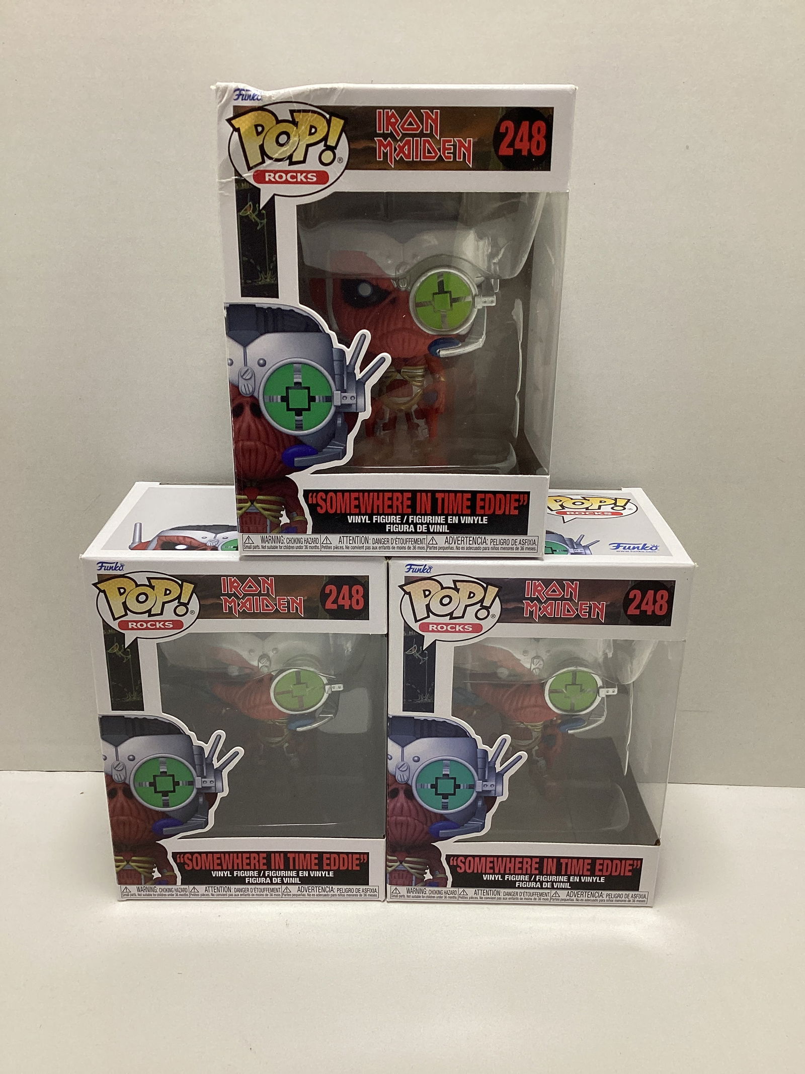 Three Iron Maiden Somewhere in Time Eddie Funko Pops: one damaged box 