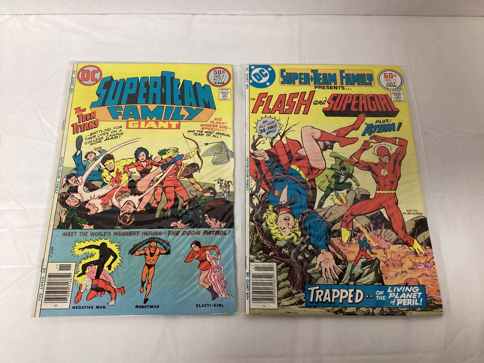 Two Super Team Family DC Comic Books: please preview and see all photos for condition 