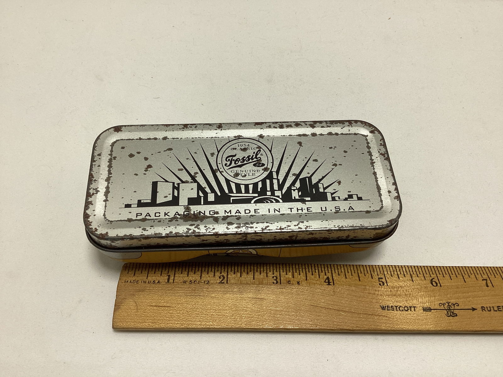 Auburn Rubber Racecar, Fossil Case, Lone Ranger Action Figure, and Auburn Airplane - 8