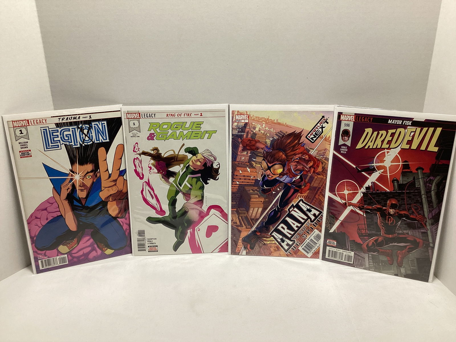 Four Marvel Comic Books: . 