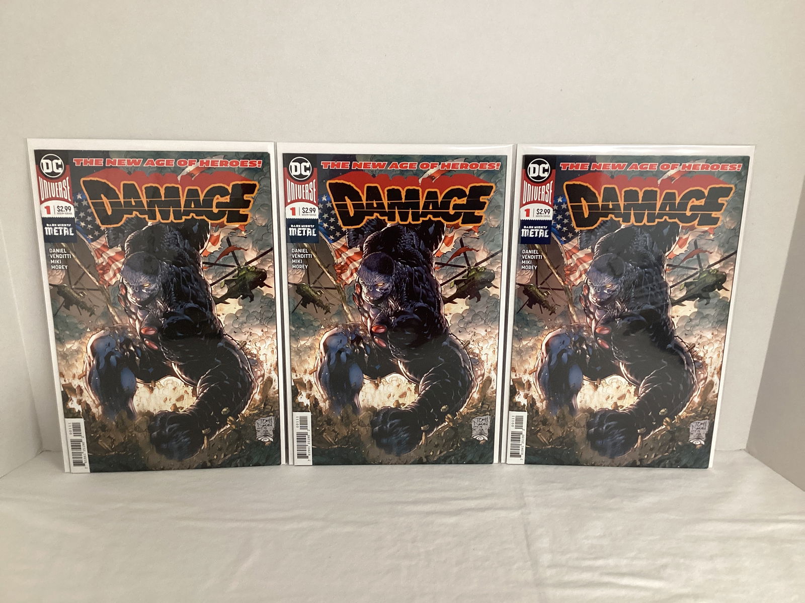 Three Damage 1 DC Comic Books: Please preview and see all photos for condition 