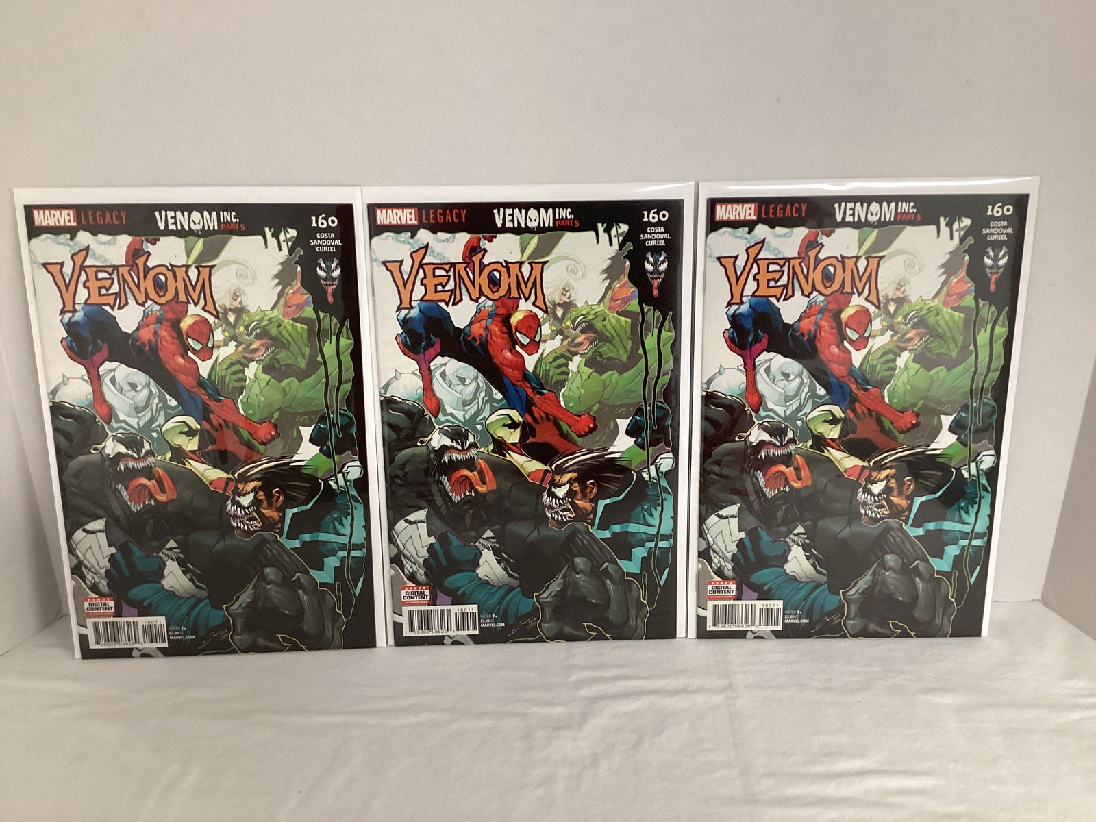 Three Venom 160 Marvel Comic Books: Please preview and see all photos for condition