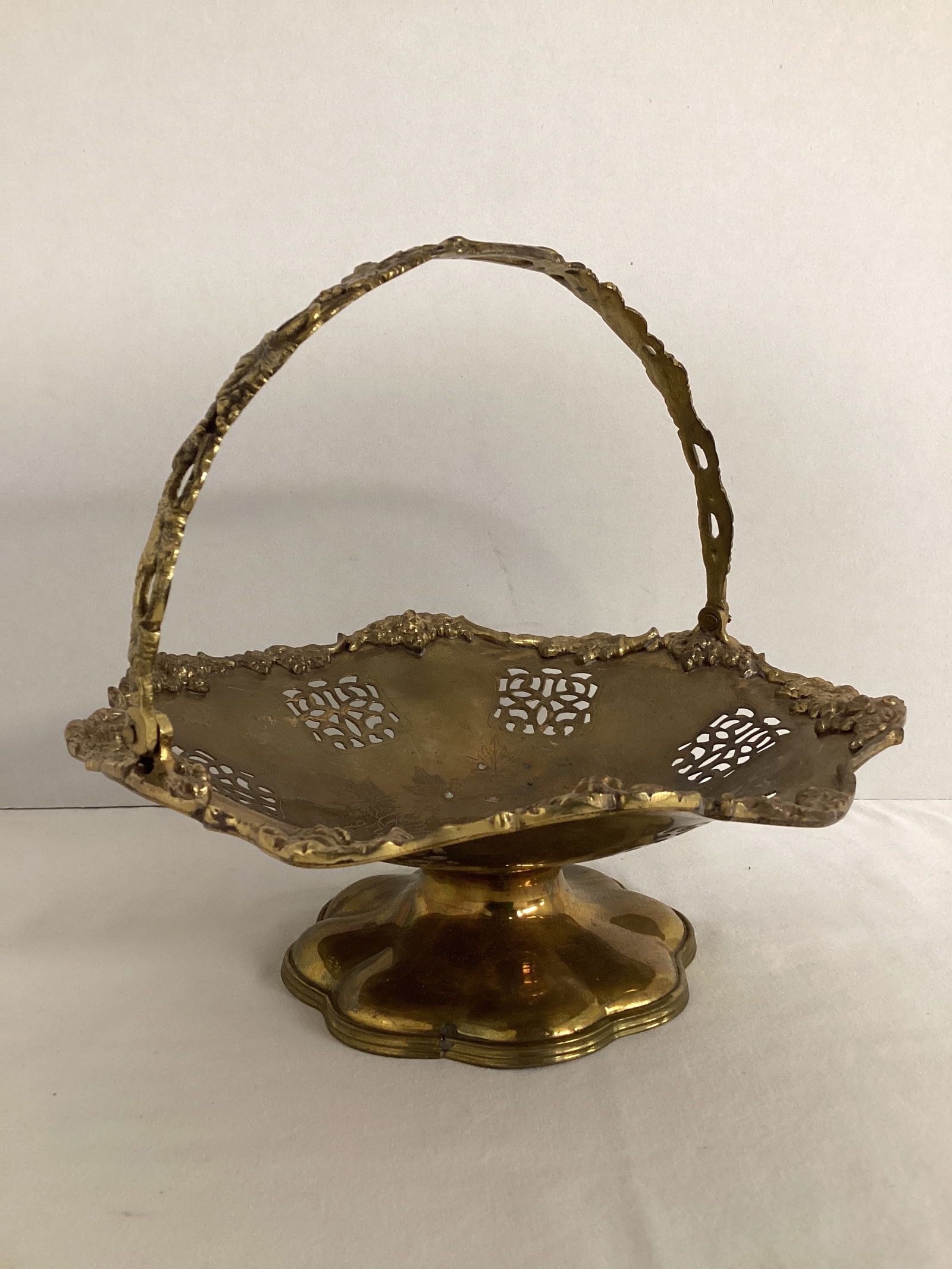 Brass Pedestal Basket: 9 1/2" diameter x 3 1/2" h not including handle 