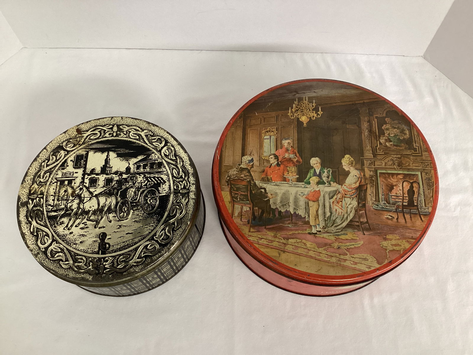 Two Vintage Tins: 8" and 10" diameter 