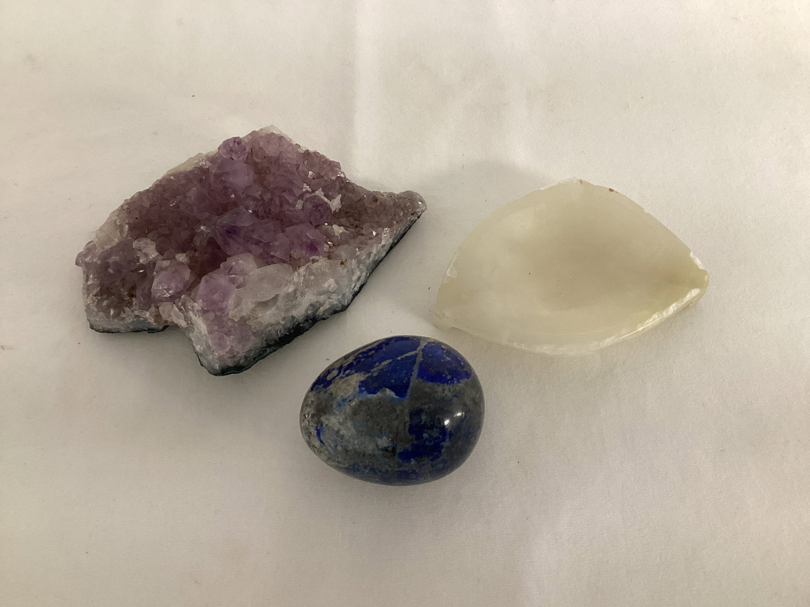 Crystal Cluster, Carved Ashtray, and Stone Egg: . 