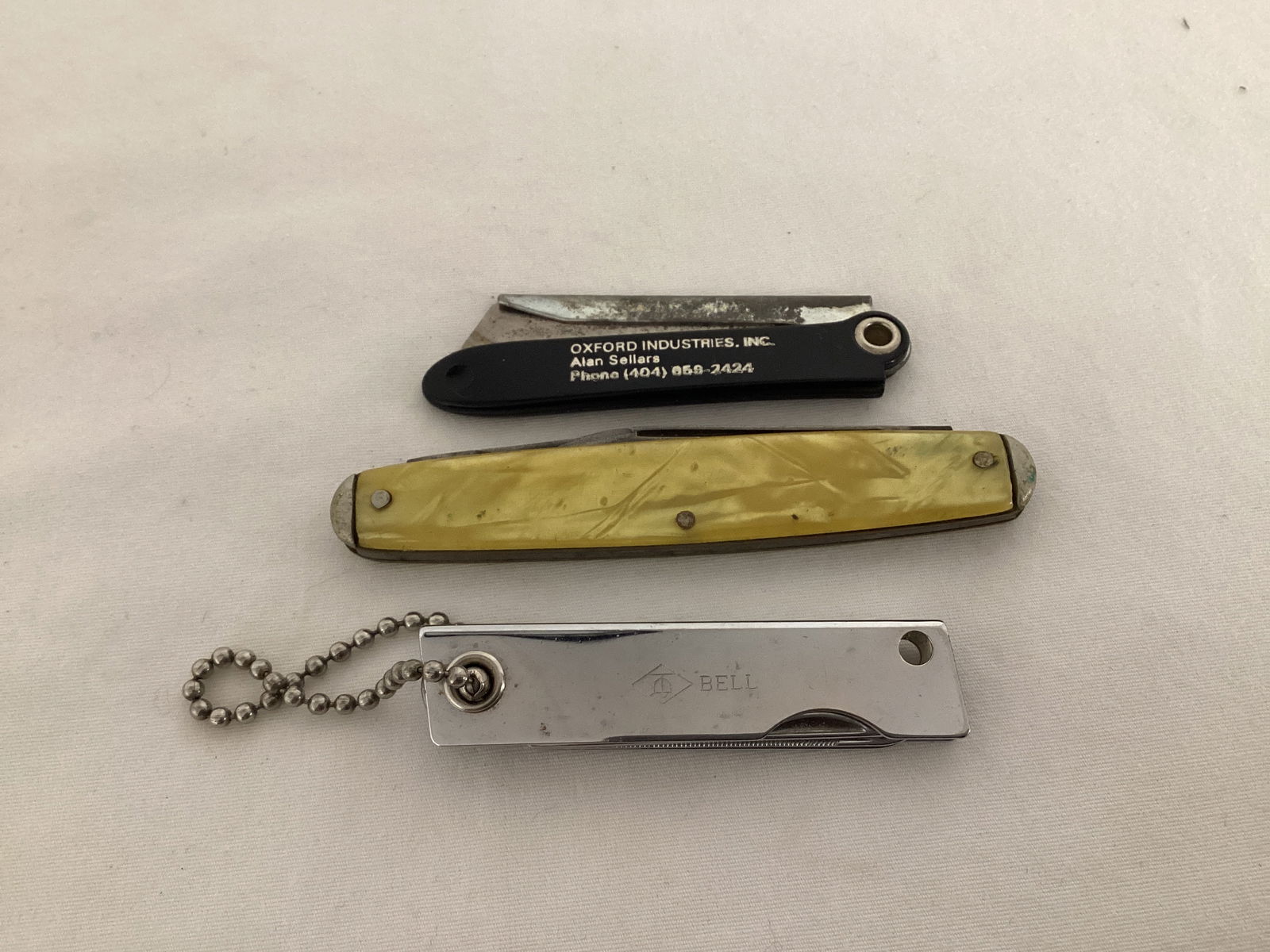 Three Pocket Knives: . 