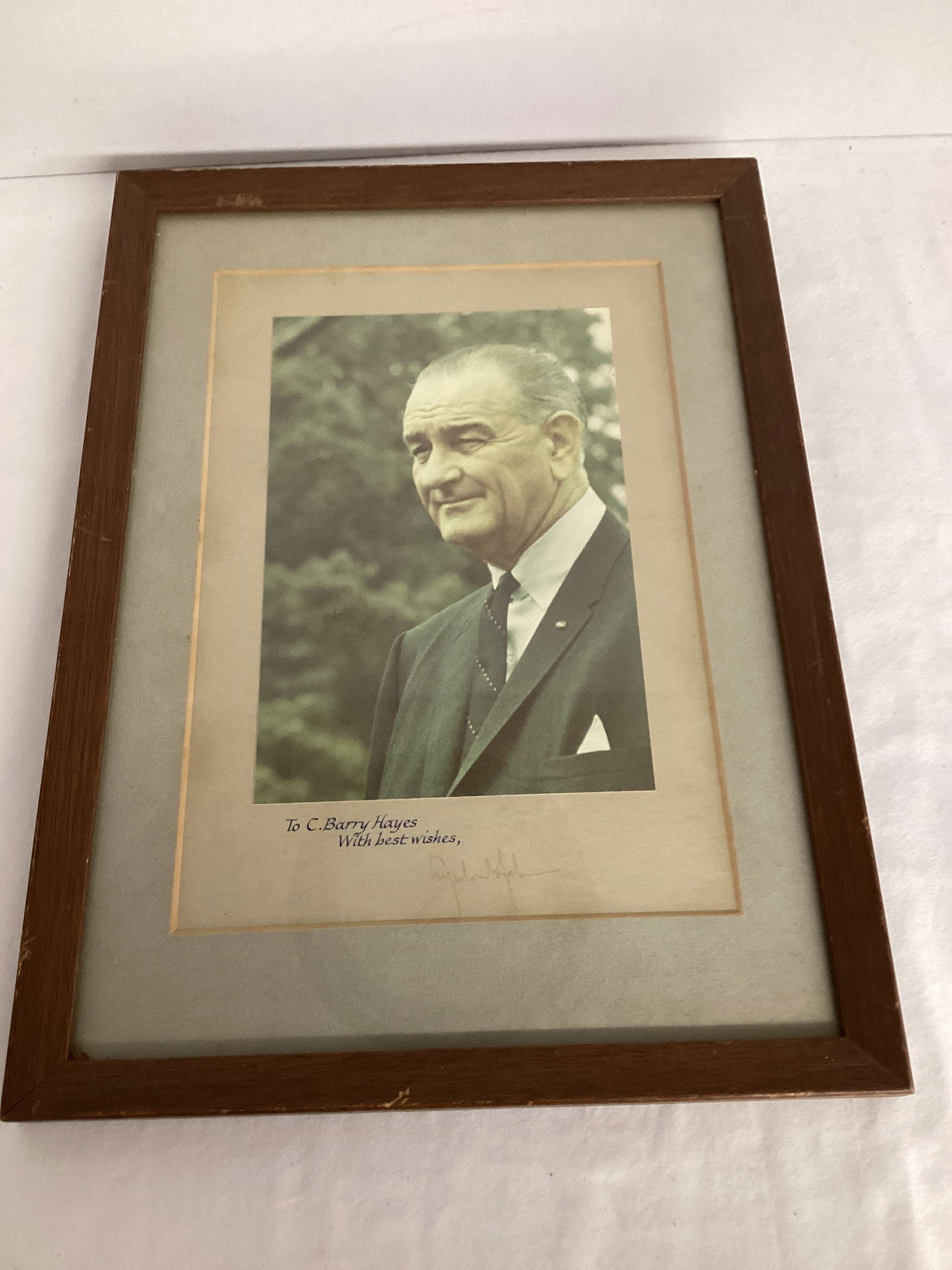 President Lyndon B Johnson Signed Paper with Attached Photo: frame measures 12 1/2" x 17", faded, unauthenticated 