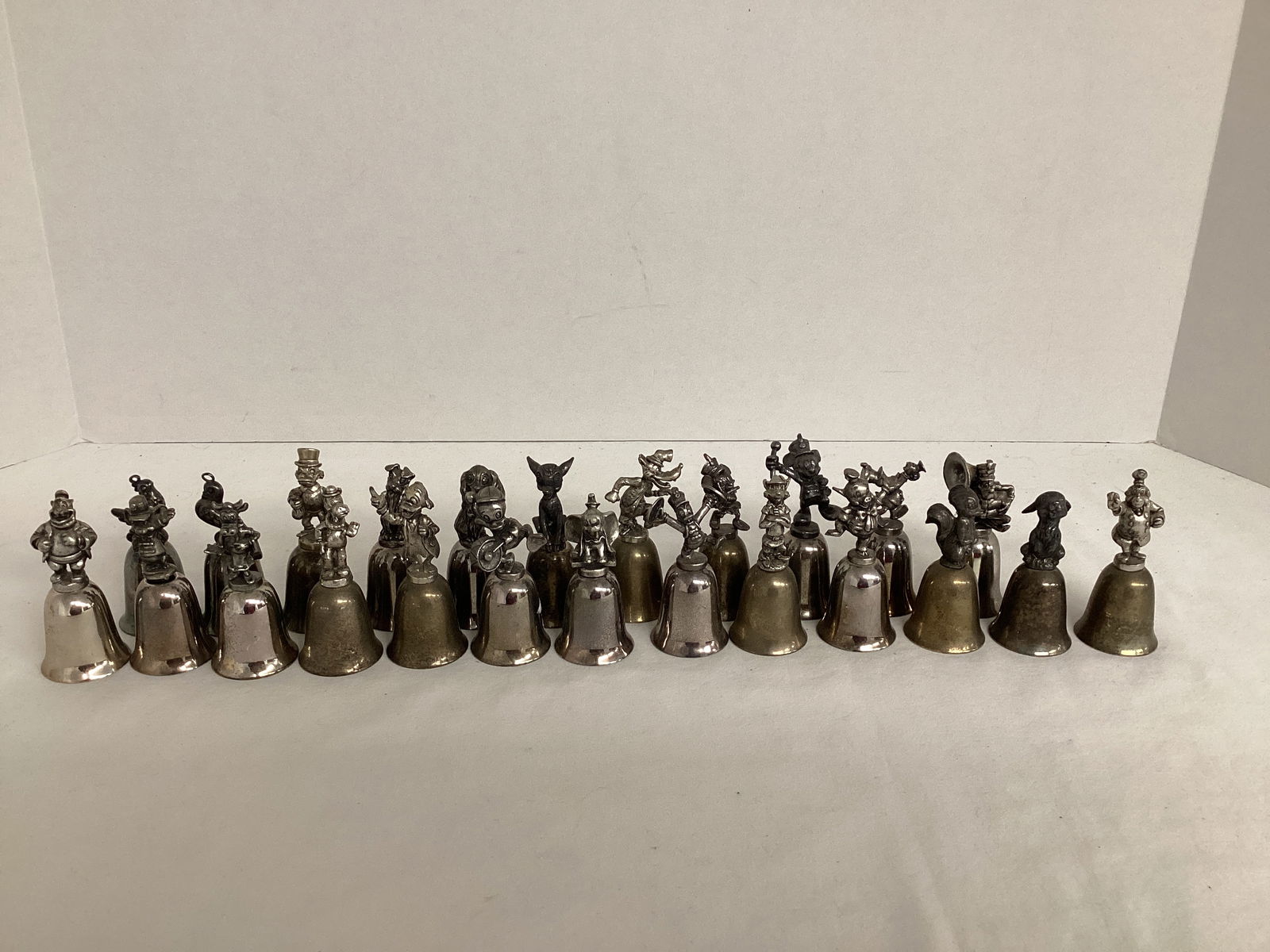 Disney Character Bells: a couple are damaged 