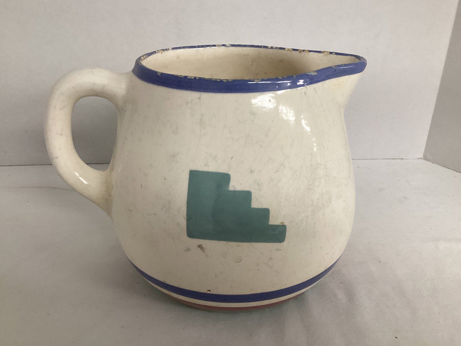 Pottery Pitcher: crazing, 6 3/4" h, chipped