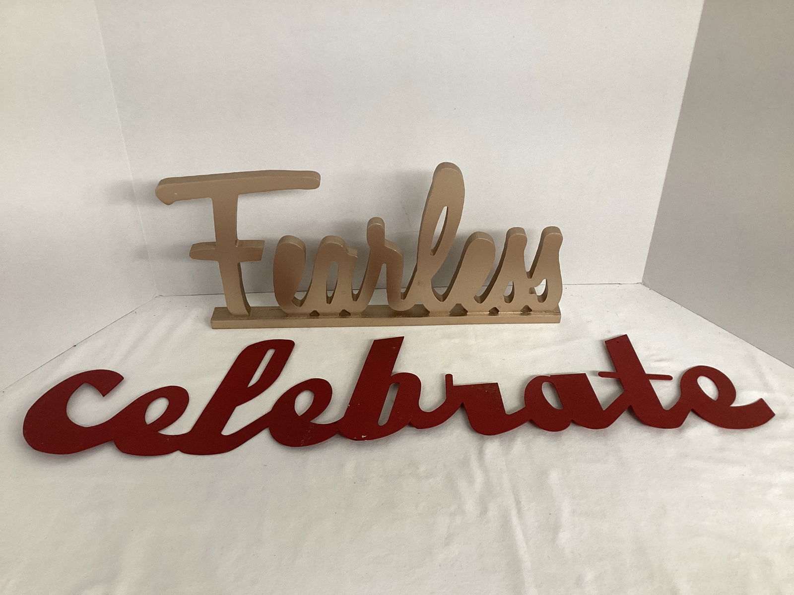 Fearless Tabletop Sign and Celebrate Metal Wall Sign: 16" and 29" L, shipping unavailable for this lot 