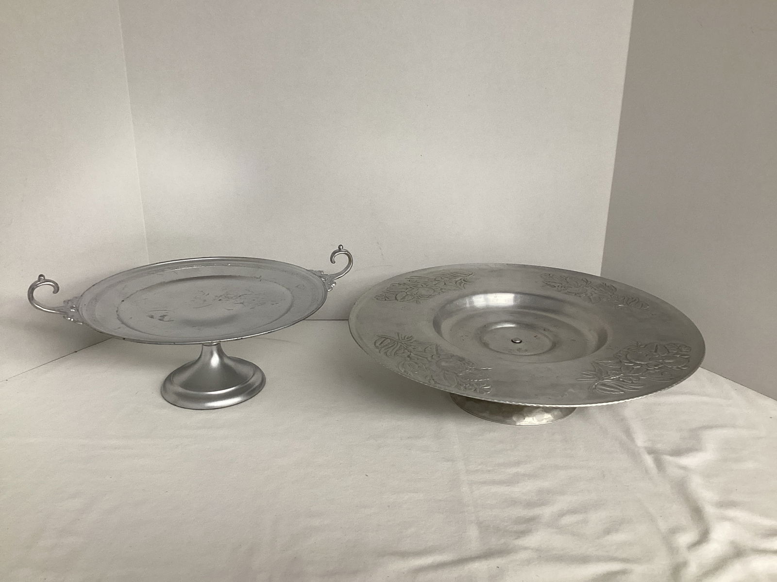 Aluminum Lazy Susan and Painted Silverplate Pedestal Plate: 14 1/2" and 10" diameter 