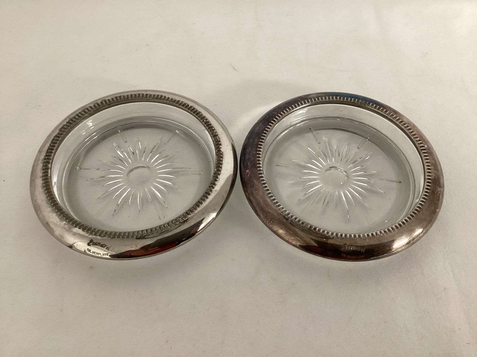 Two Leonard Silverplate and Glass Coasters: 4" diameter 