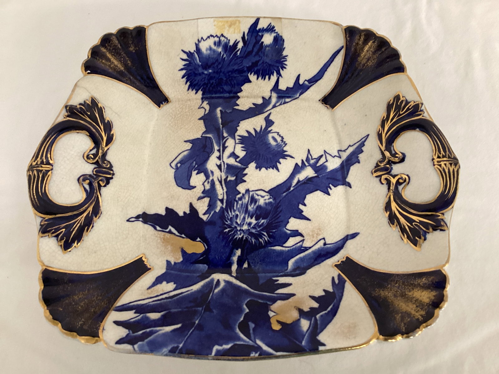 Antique The Potters Wheel Tray: crazing, Thistle pattern, 10 3/4" diameter 