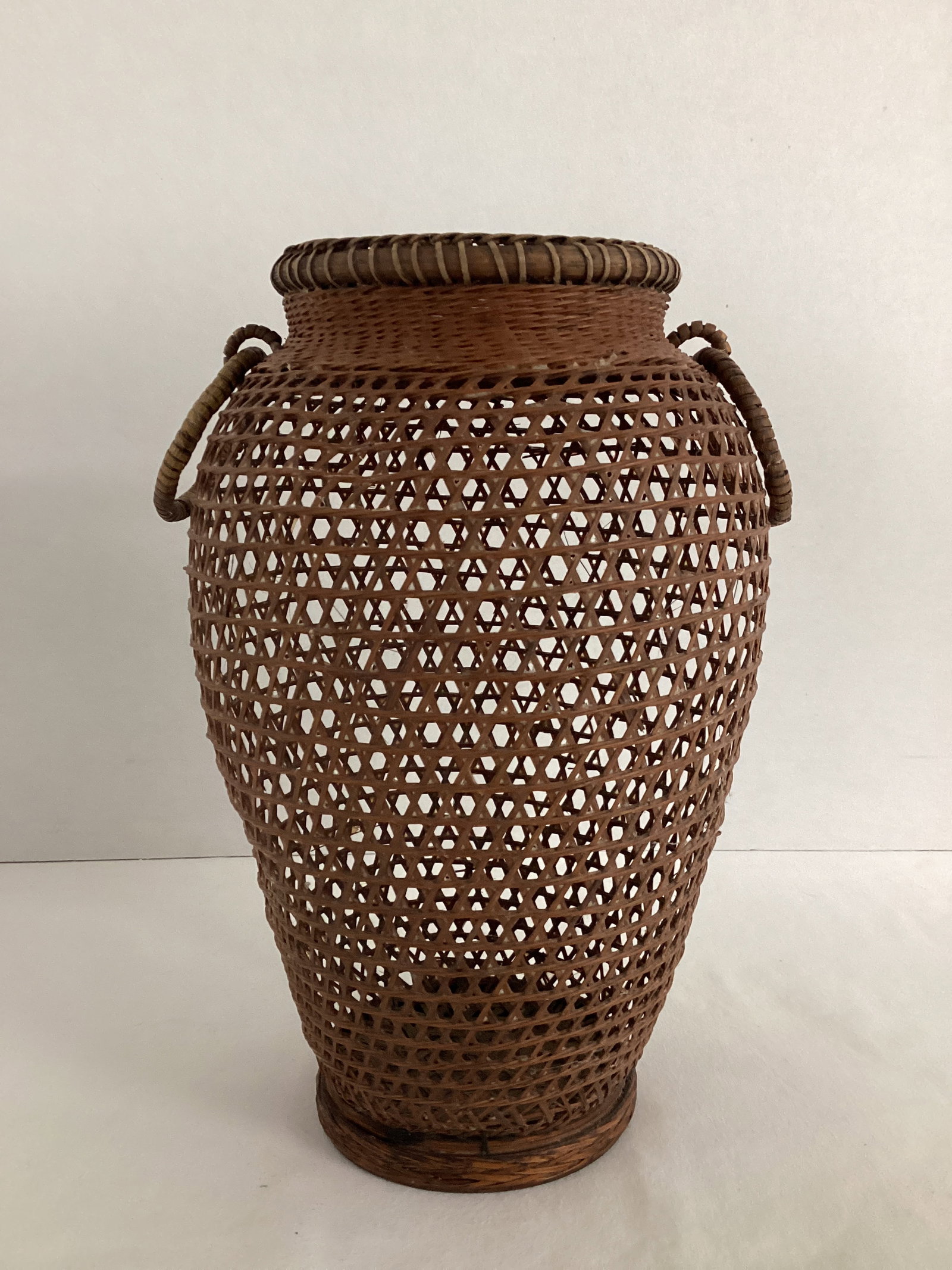 Woven Vase with Handles: 9" h, a couple of small dents 