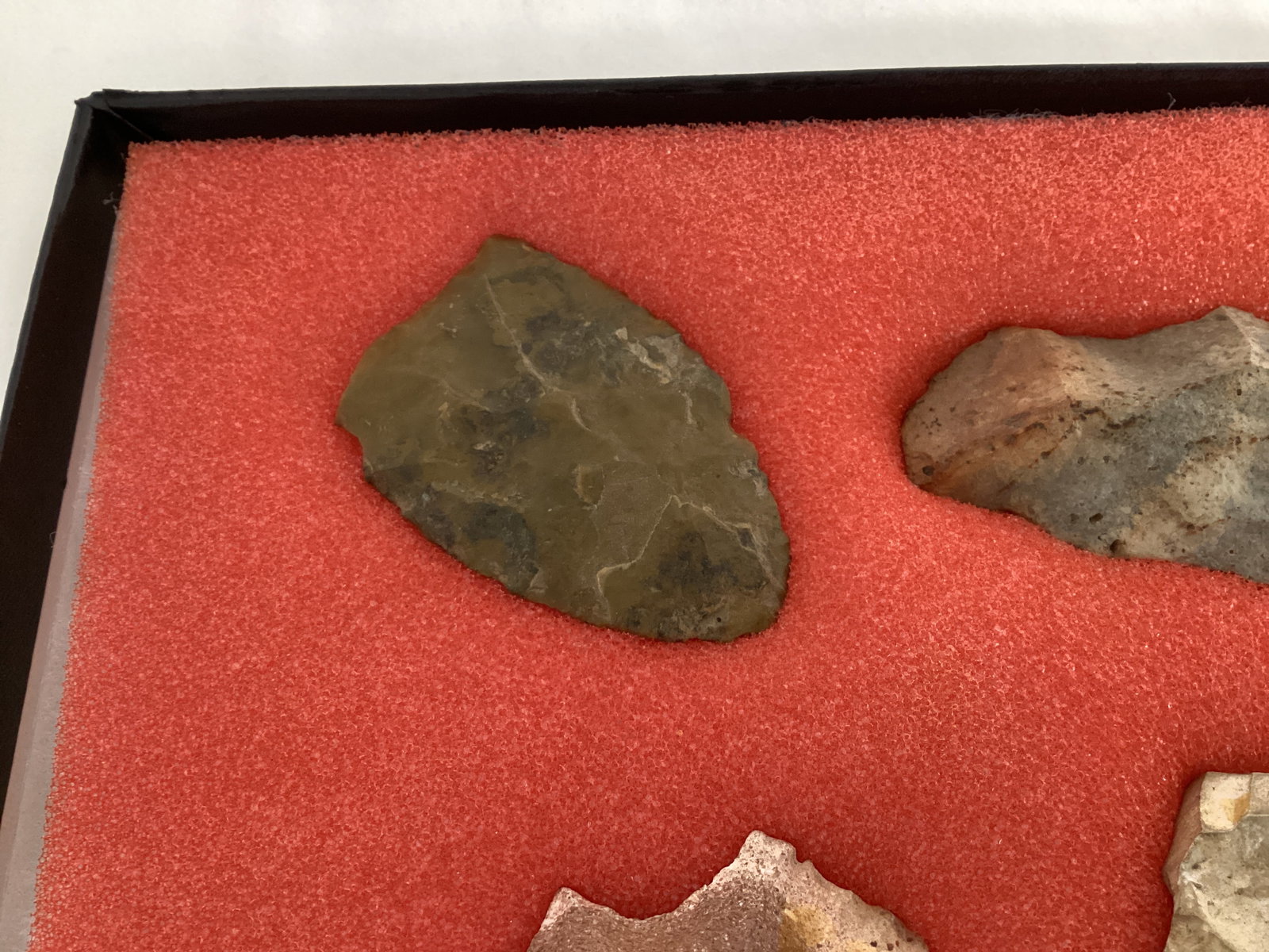 Six Carved Stone Spearheads in Display Case - 6