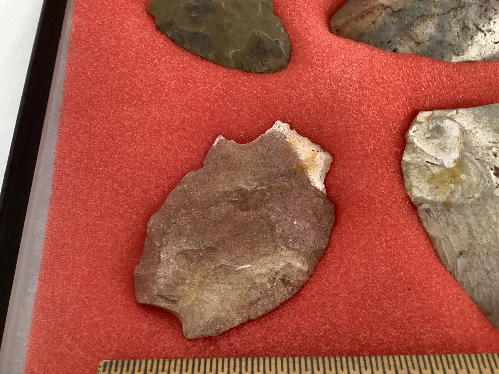 Six Carved Stone Spearheads in Display Case - 7