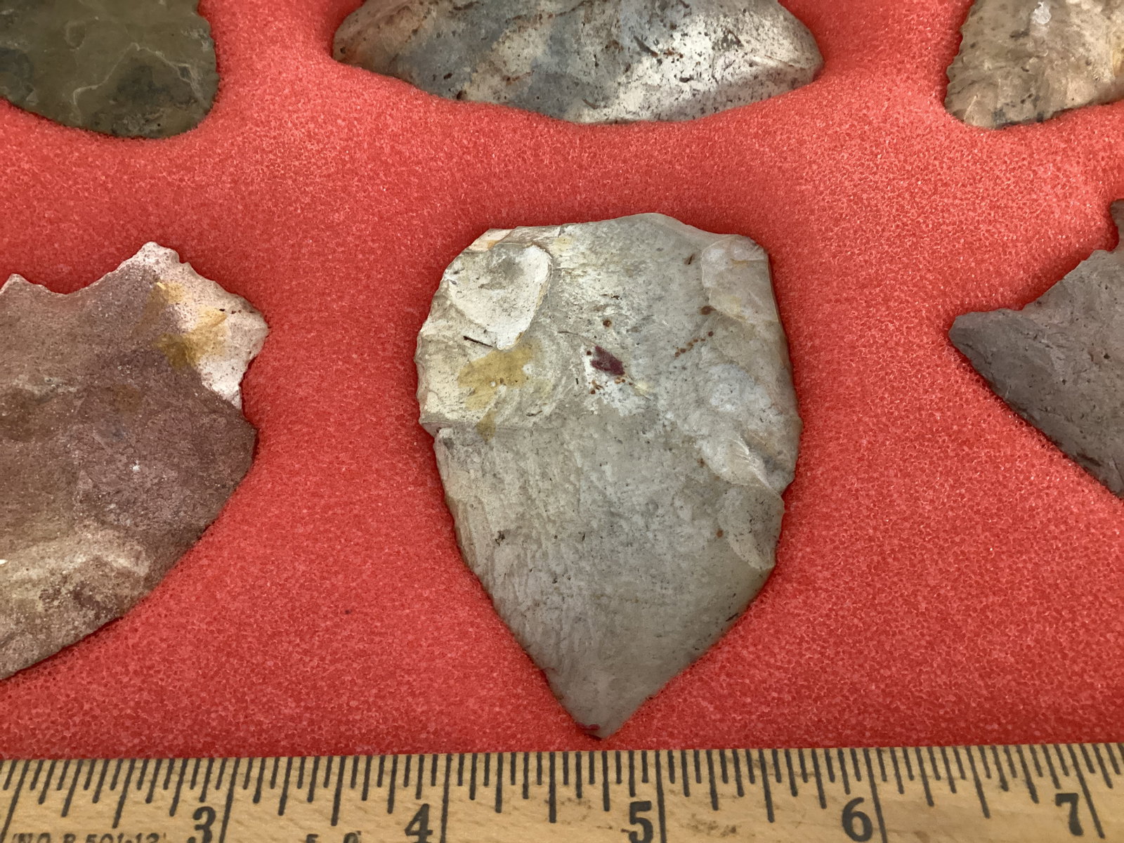 Six Carved Stone Spearheads in Display Case - 8