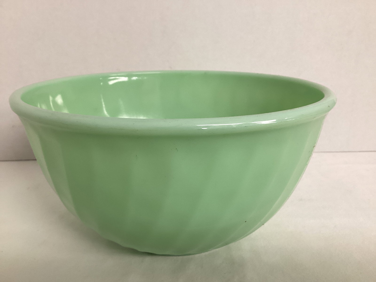 Vintage Fire King Swirl Pattern Jadeite Mixing Bowl: 9" diameter x 4 1/2" h 
