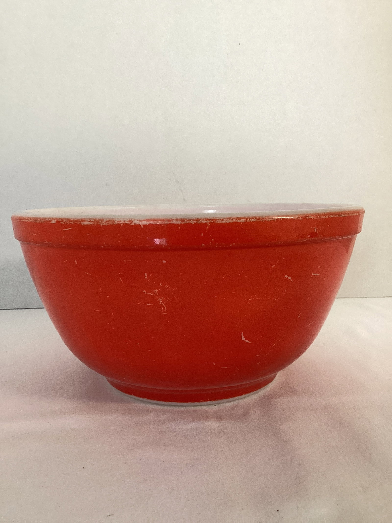Red Pyrex Mixing Bowl: some finish wear, 7 1/4" diameter x 3 3/4" h 