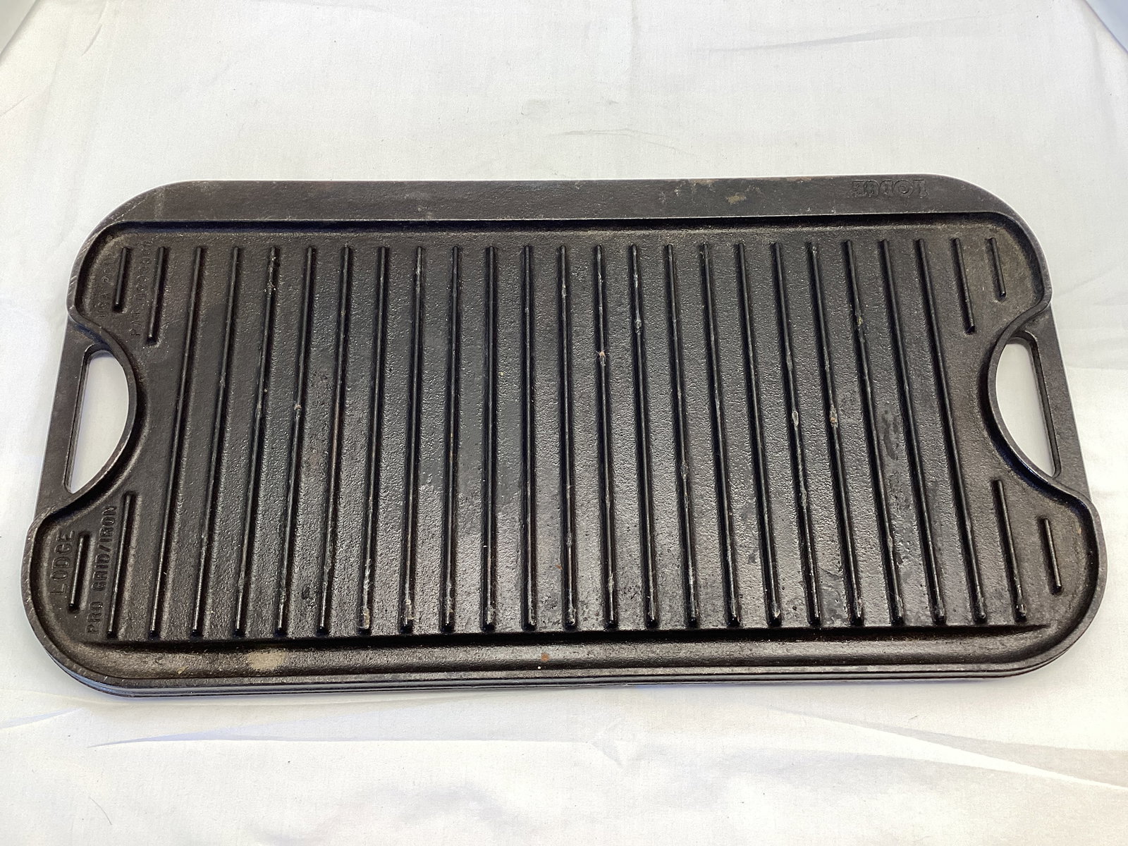 Lodge Pro Cast Iron Double Sided Griddle: 10 1/2" x 20", shipping unavailable for this lot 