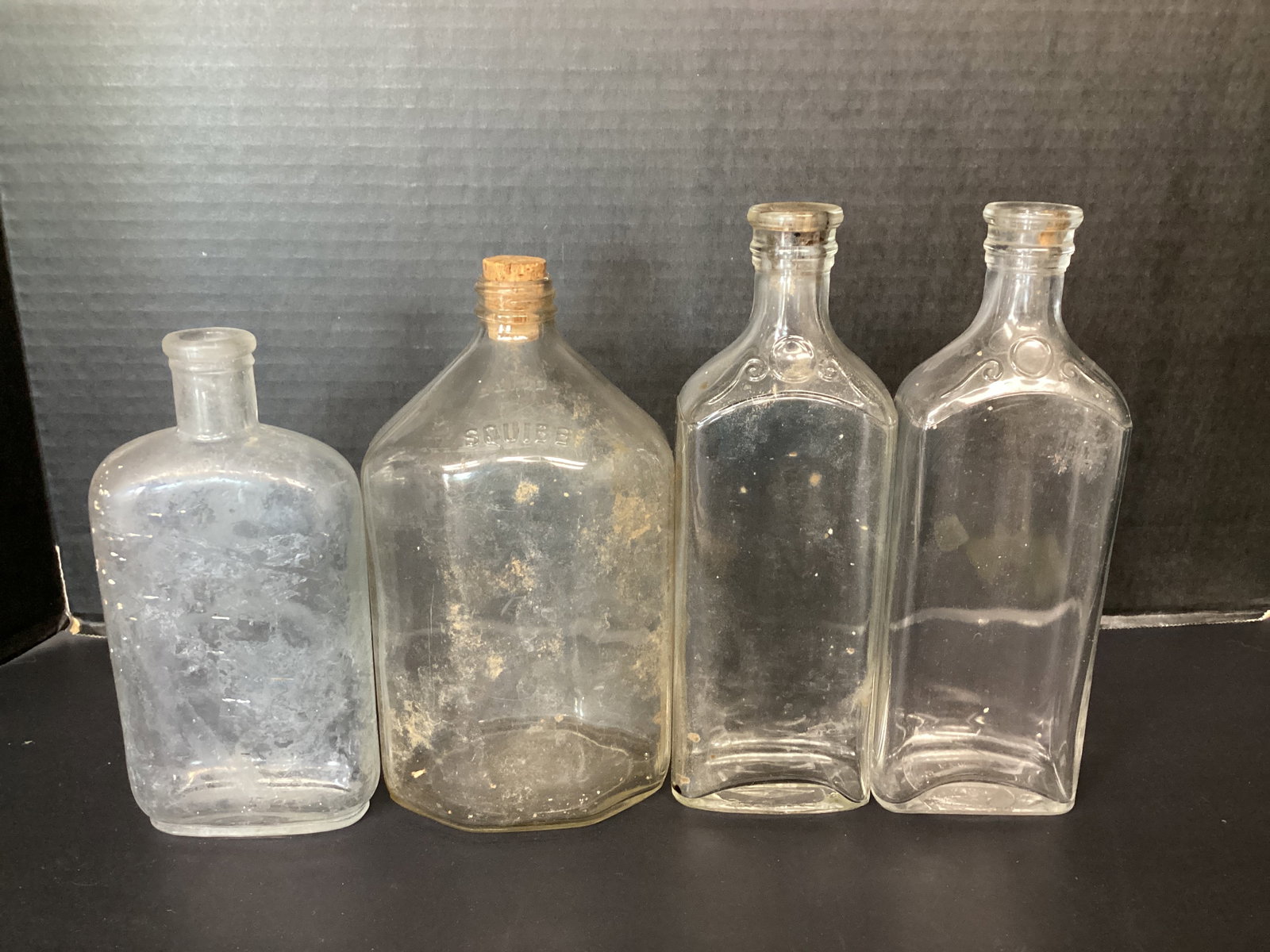 Four Vintage Bottles: 7 1/2" to 9" h 