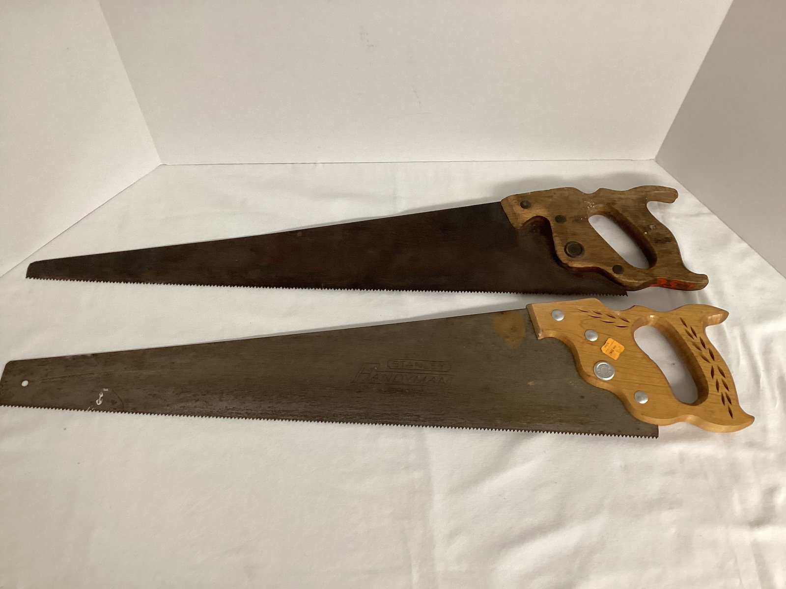 Two Hand Saws: one is Stanley, 29 1/2" long, shipping unavailable for this lot 